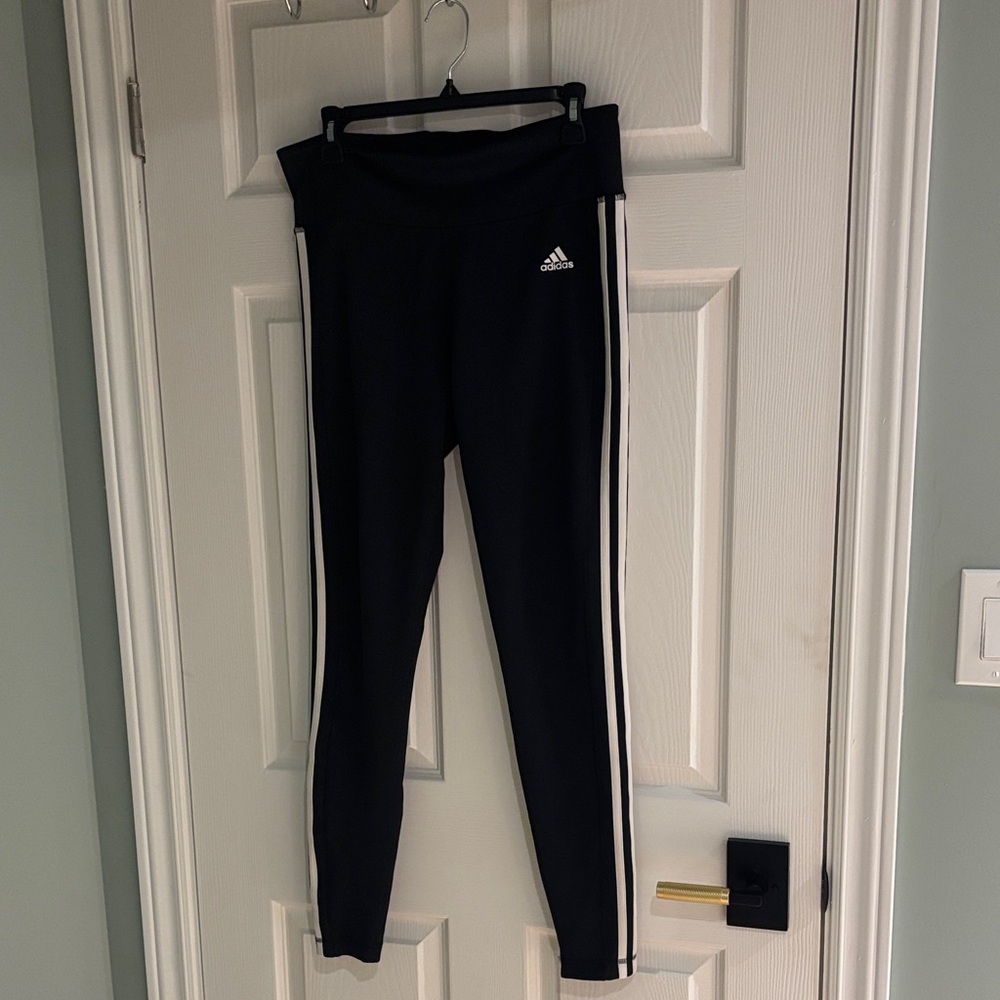 Adidas classic black leggings with the three stripes